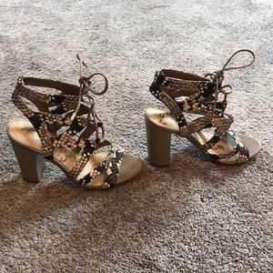 Snakeskin tie up heels